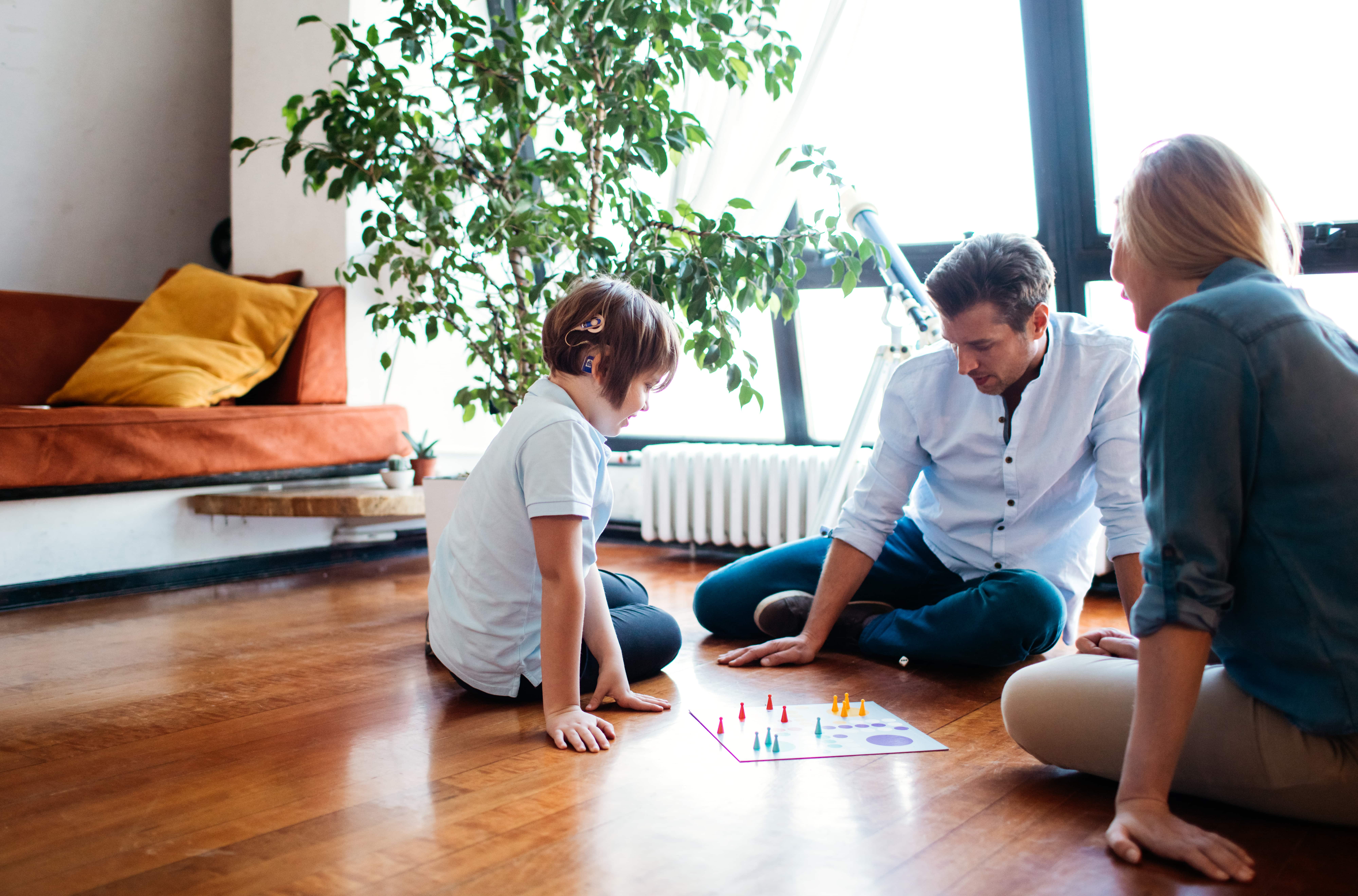 CSHA - Child with Cochlear Implant Interacting with Board Game