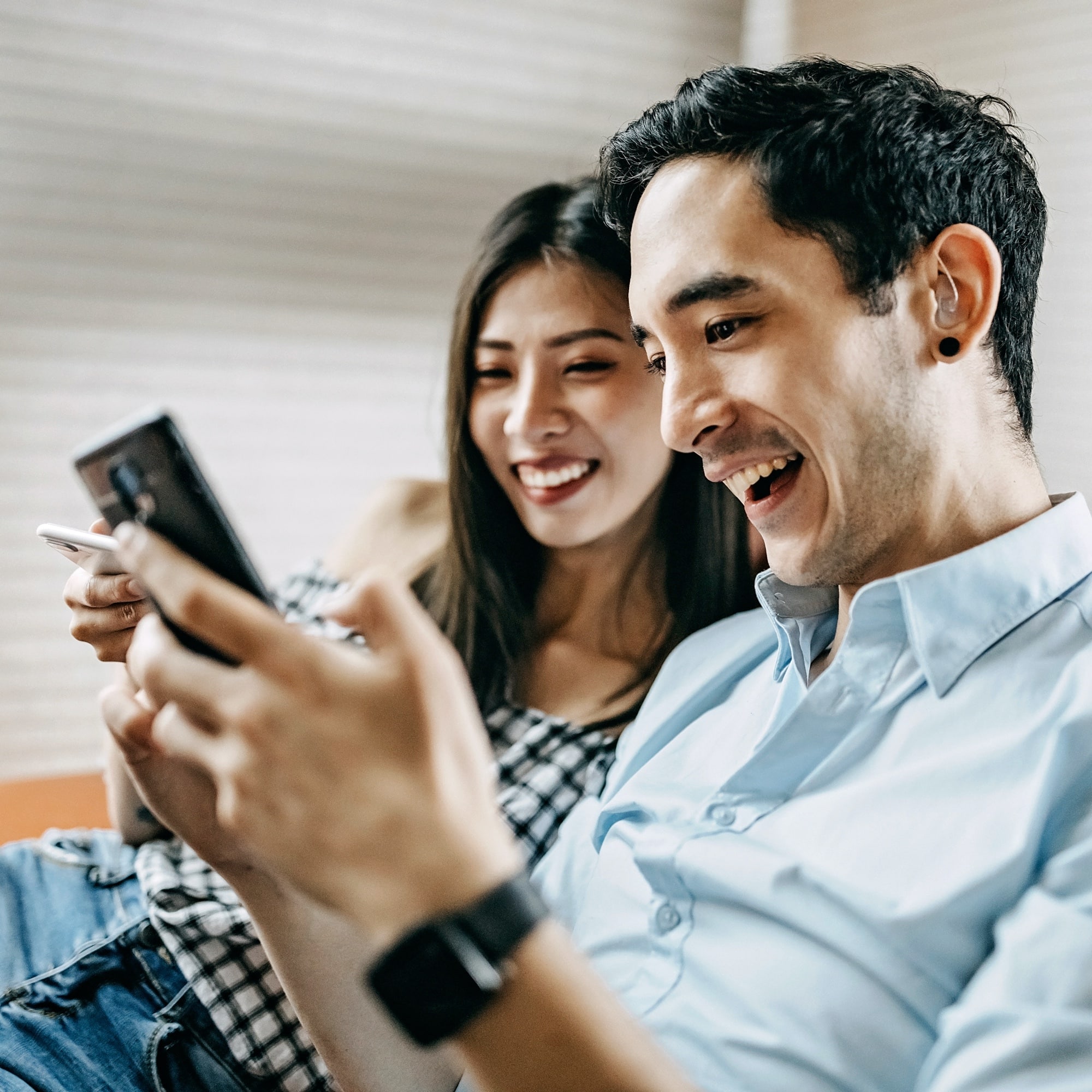 couple working on phones